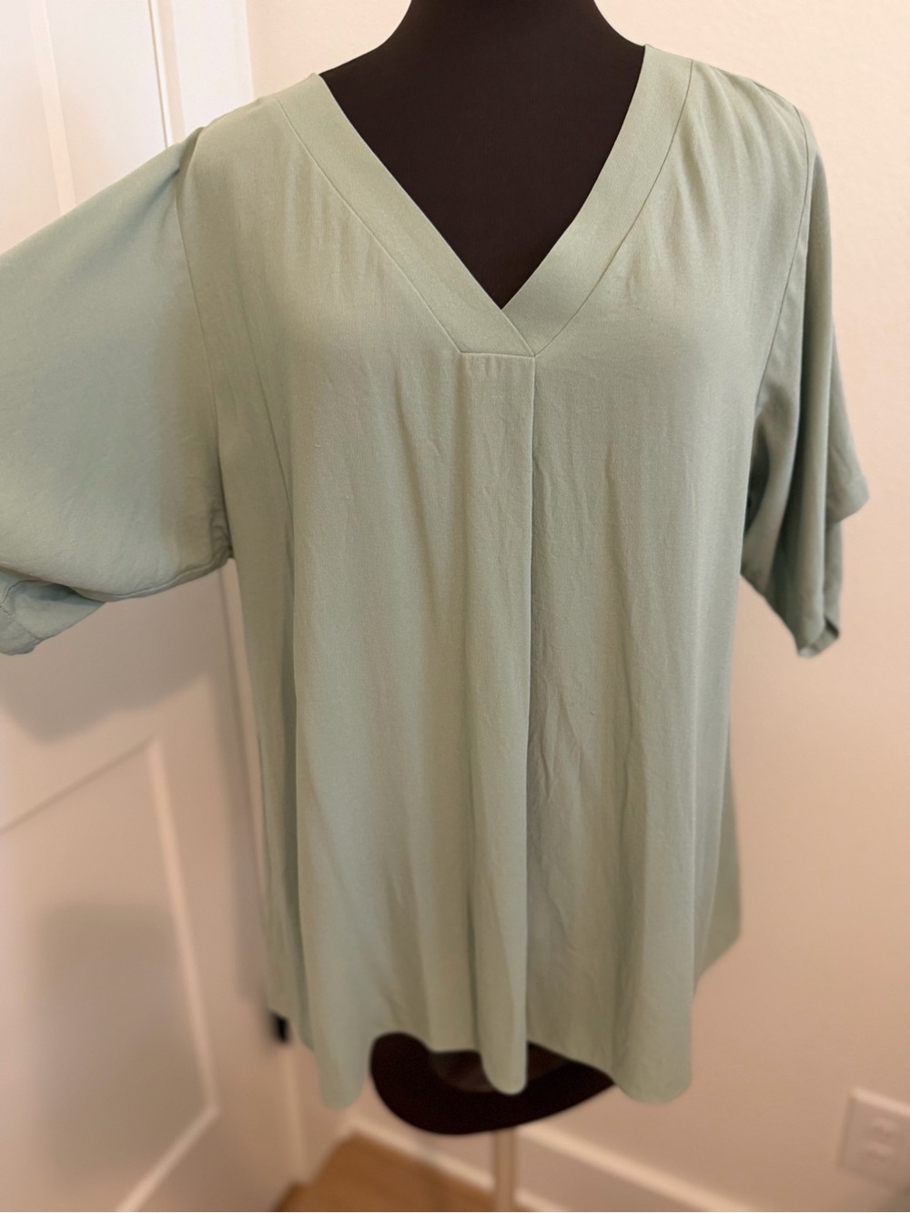 Eileen Fisher silk tunic top.  Size M in green.
